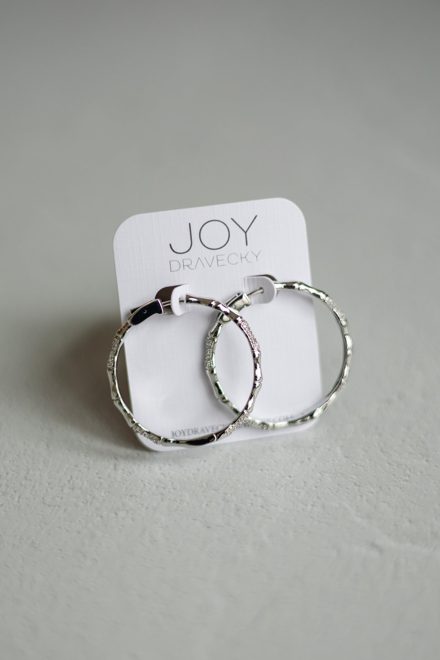 Joy Dravecky silver hoop earrings