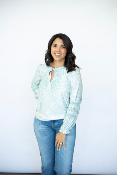 Light teal long sleeve blouse