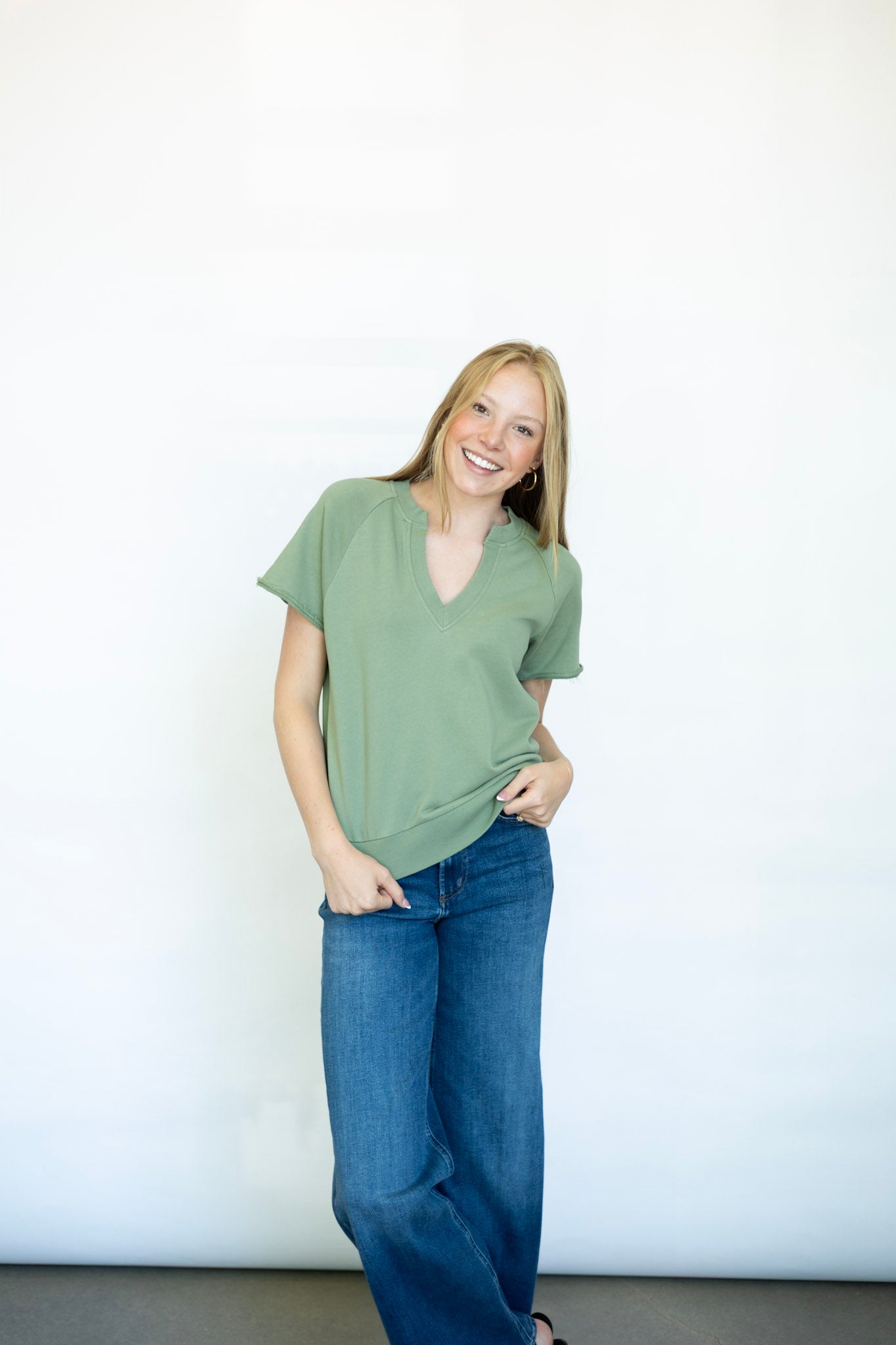 Casual green tee with cut out neckline