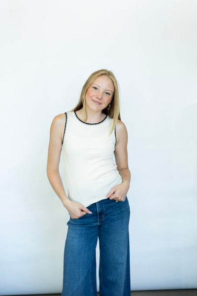 Cream tank top with black stitched detailing