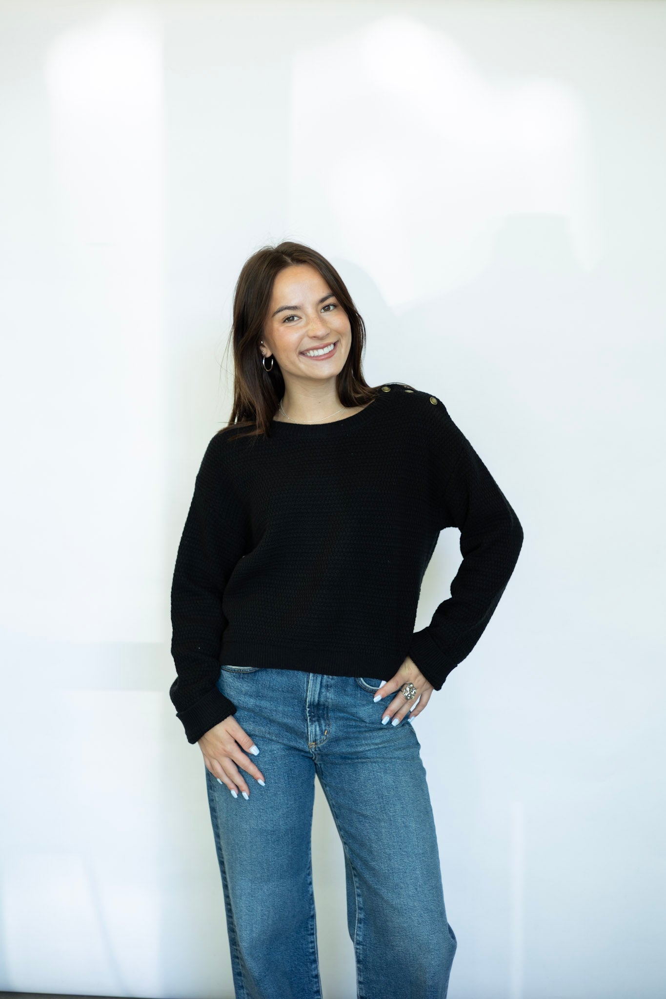 Black sweater with buttons on shoulder