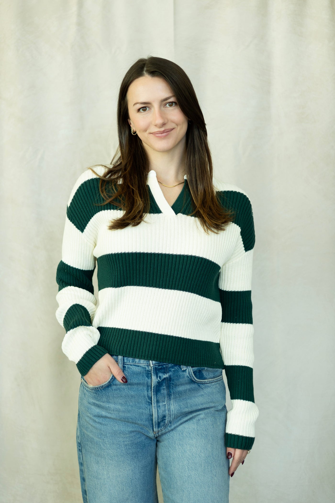 White and evergreen striped sweater