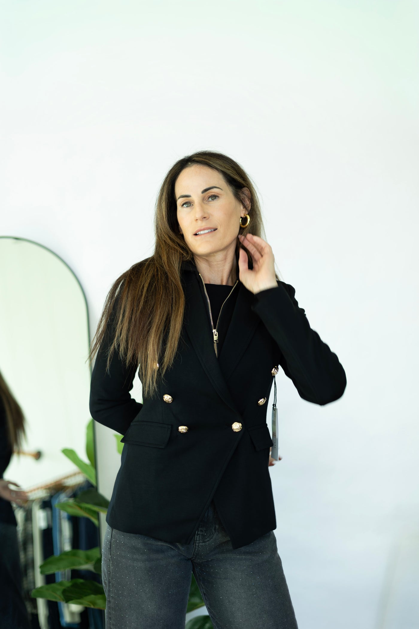 Women's black blazer with hood