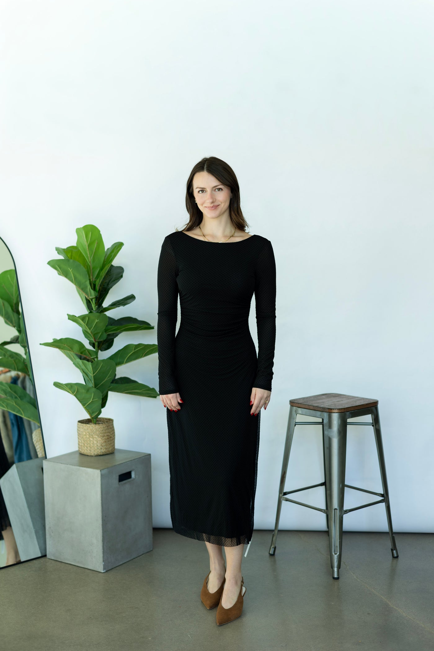 Long, black dress with polka dots