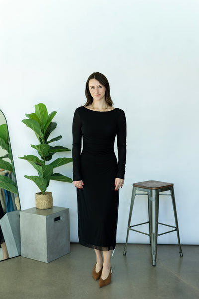 Long, black dress with polka dots