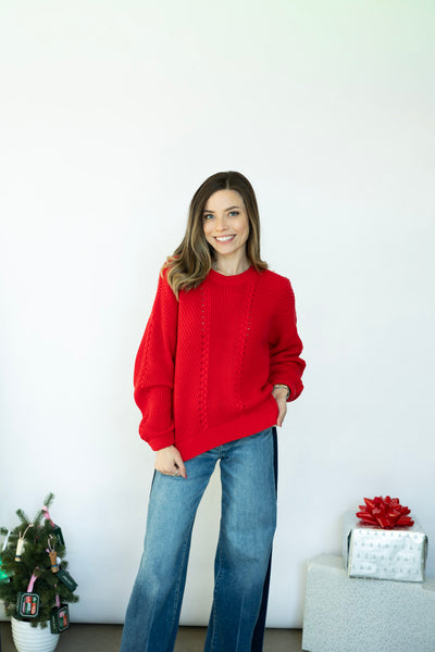 Bright red knitted sweater