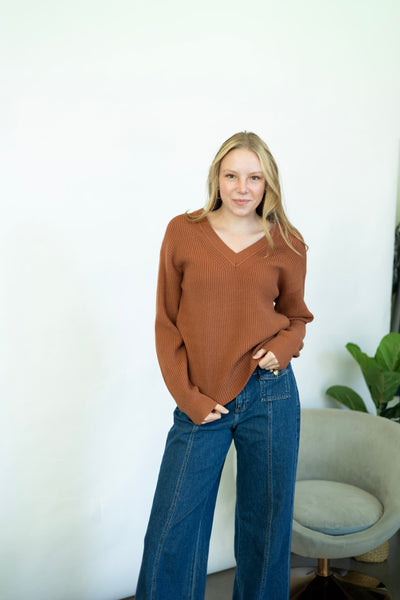 Women's orange v-neck sweater