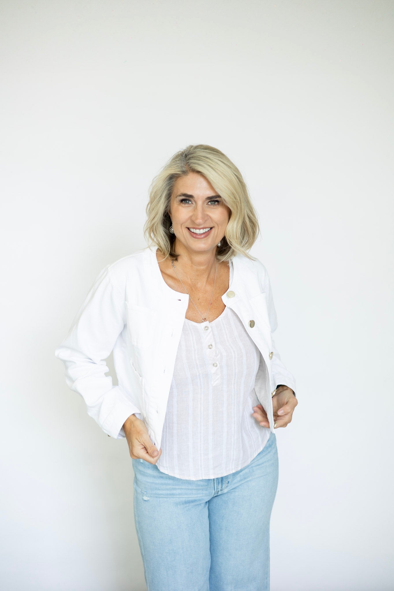 Cropped white denim jacket