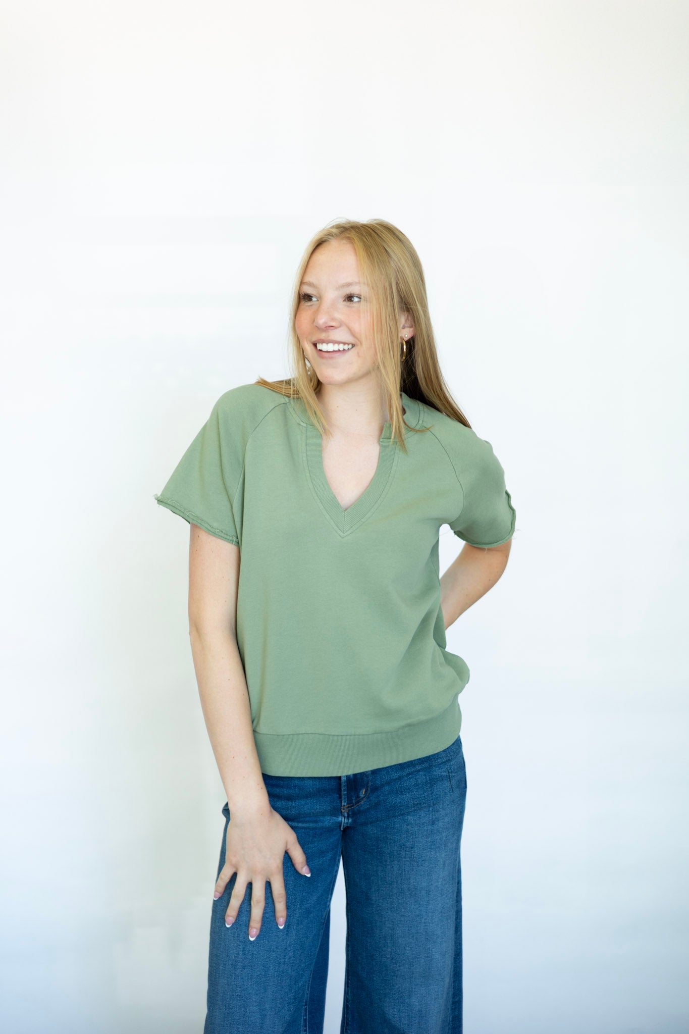 Casual green tee with cut out neckline