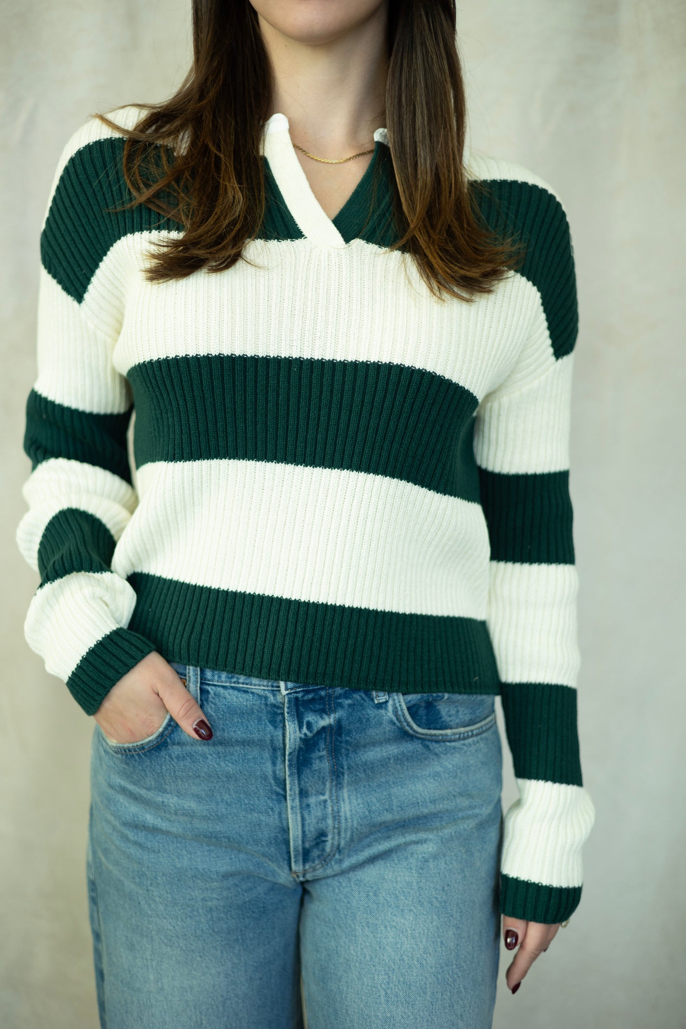 White and evergreen striped sweater