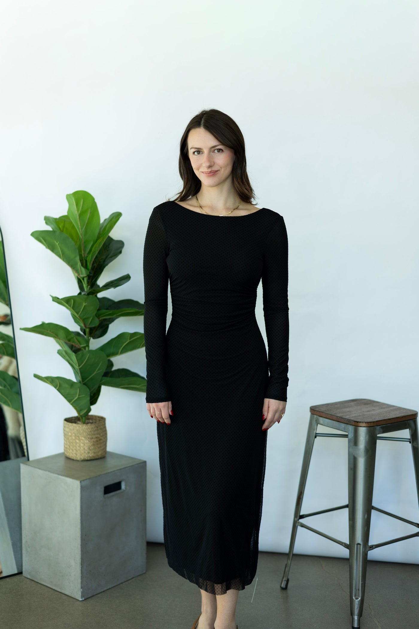 Long, black dress with polka dots