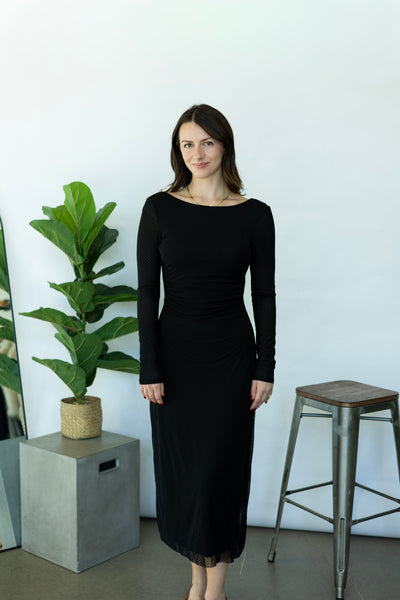 Long, black dress with polka dots