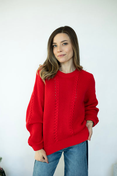 Bright red knitted sweater