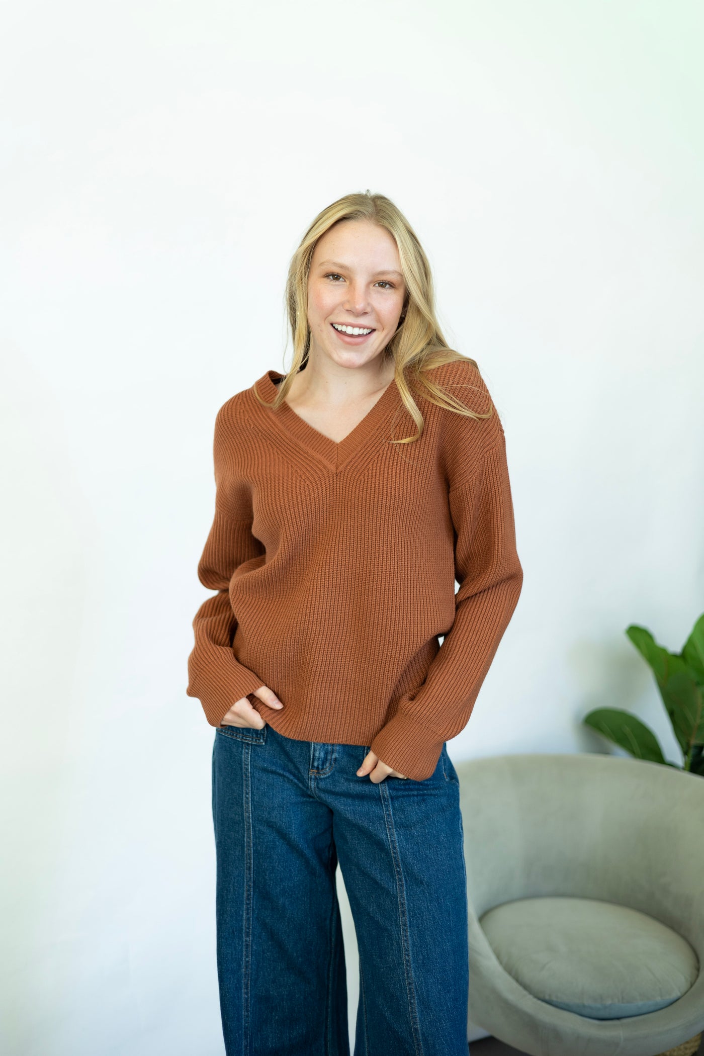 Women's orange v-neck sweater