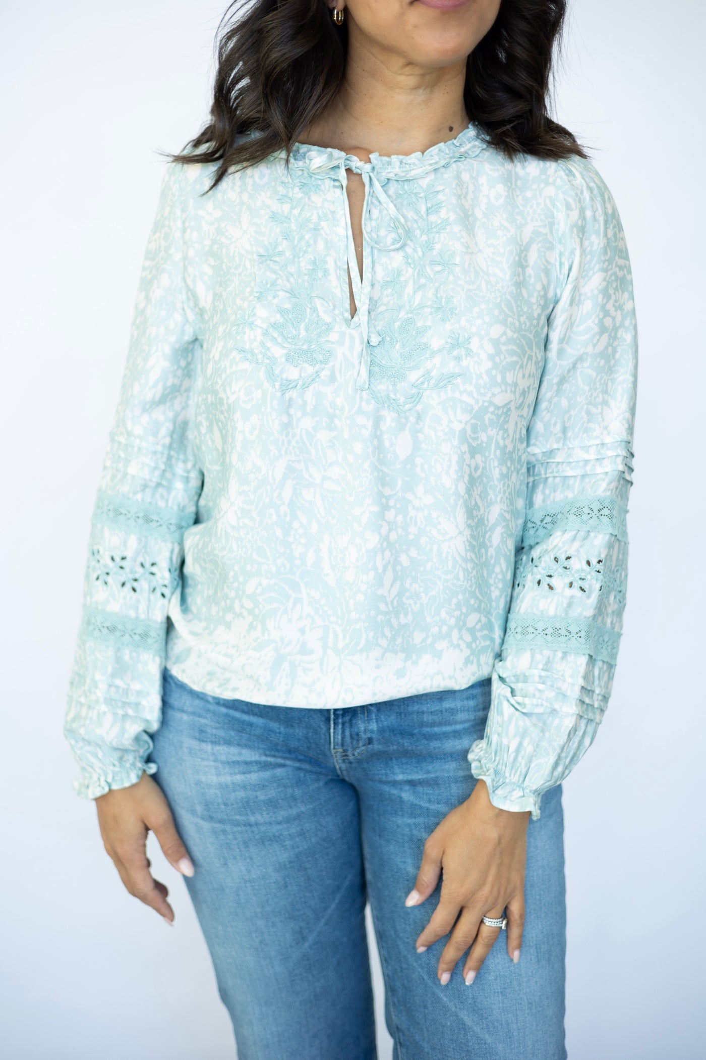 Light teal long sleeve blouse