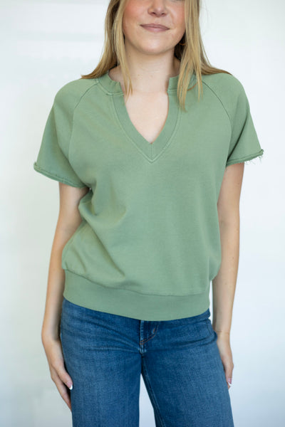Casual green tee with cut out neckline