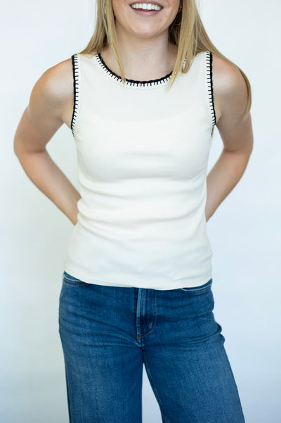 Cream tank top with black stitched detailing