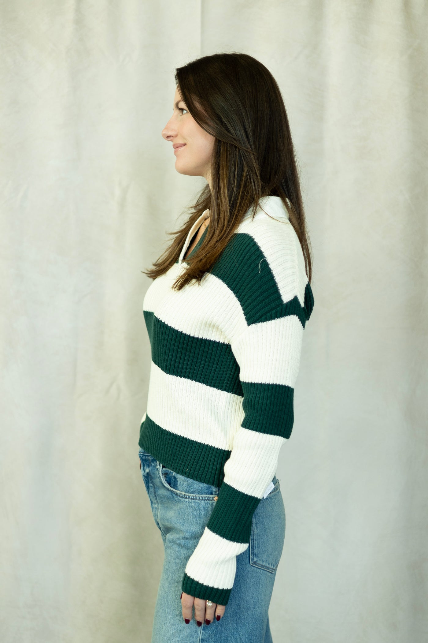 White and evergreen striped sweater