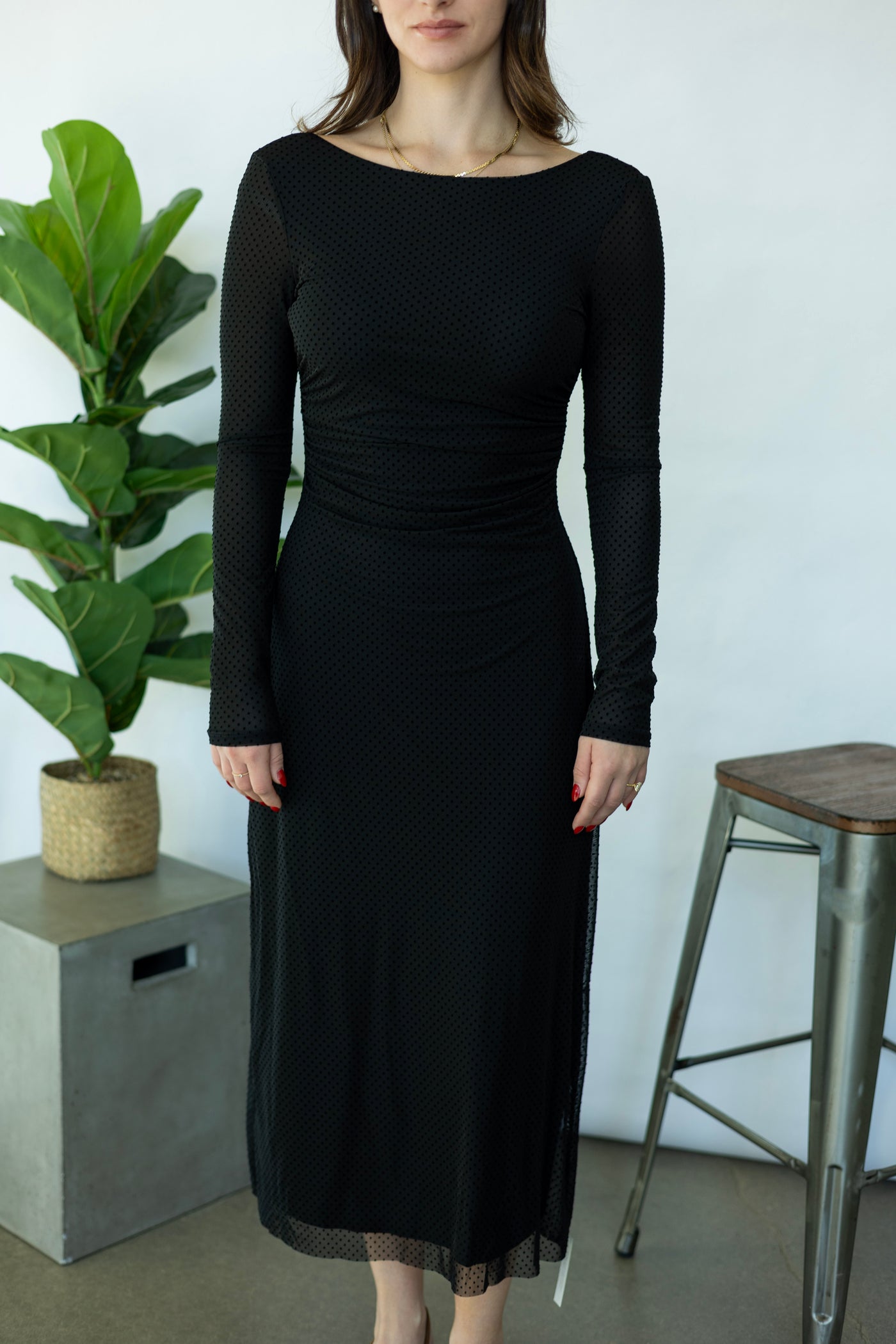 Long, black dress with polka dots