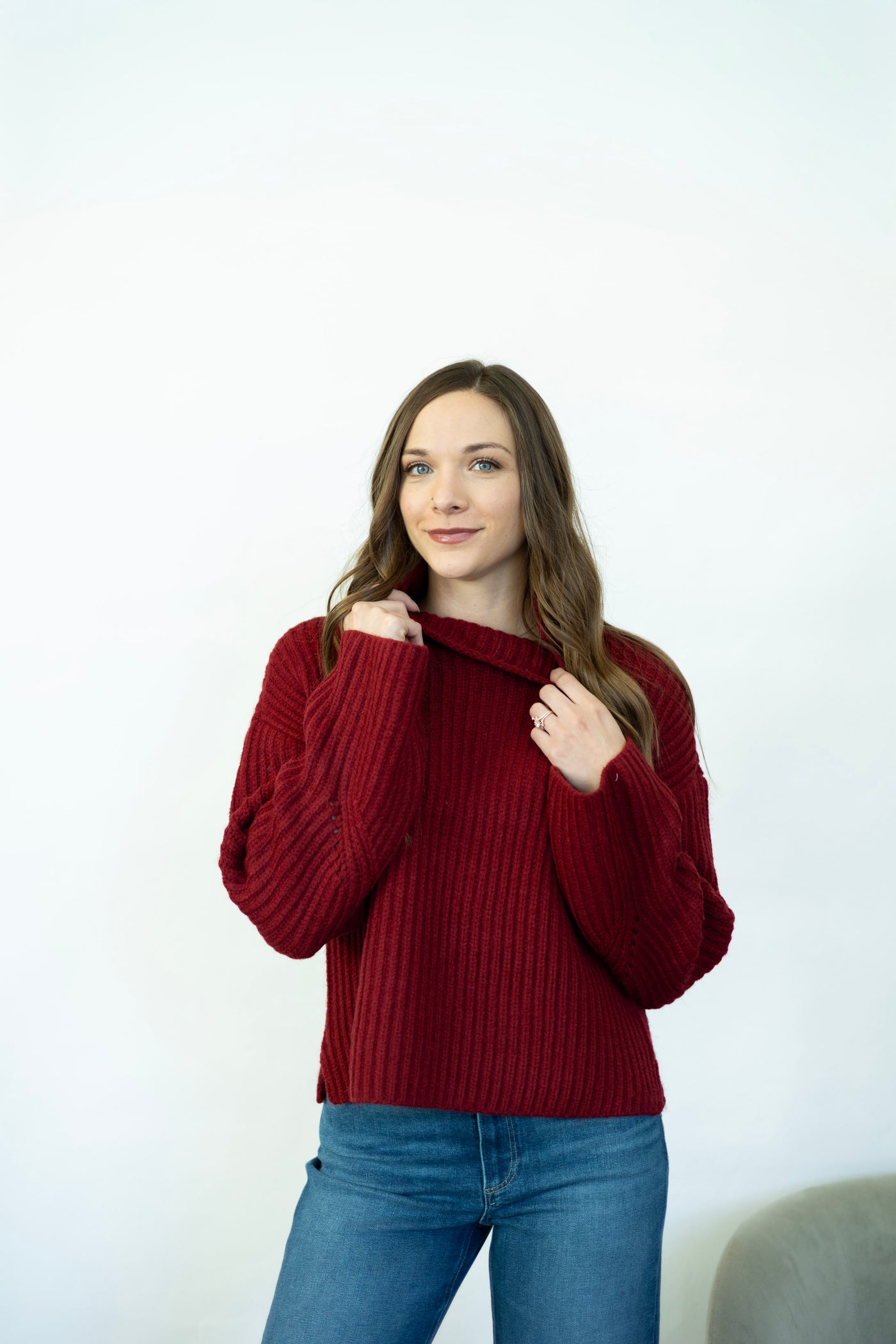 Red turtleneck sweater with wide sleeves