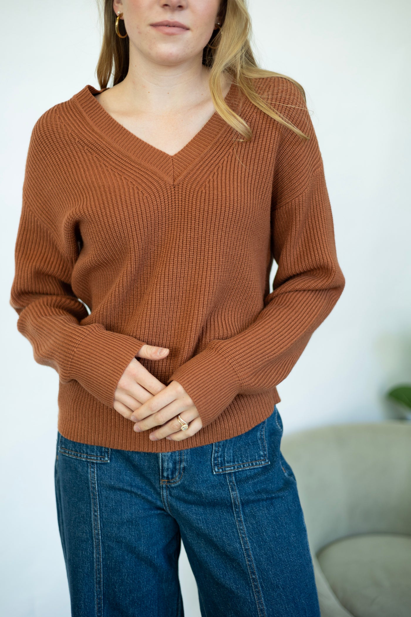 Women's orange v-neck sweater