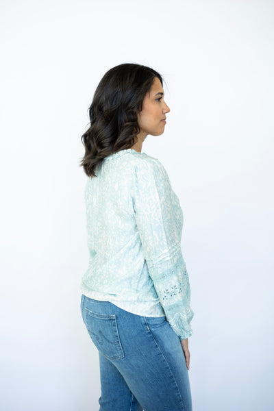 Light teal long sleeve blouse