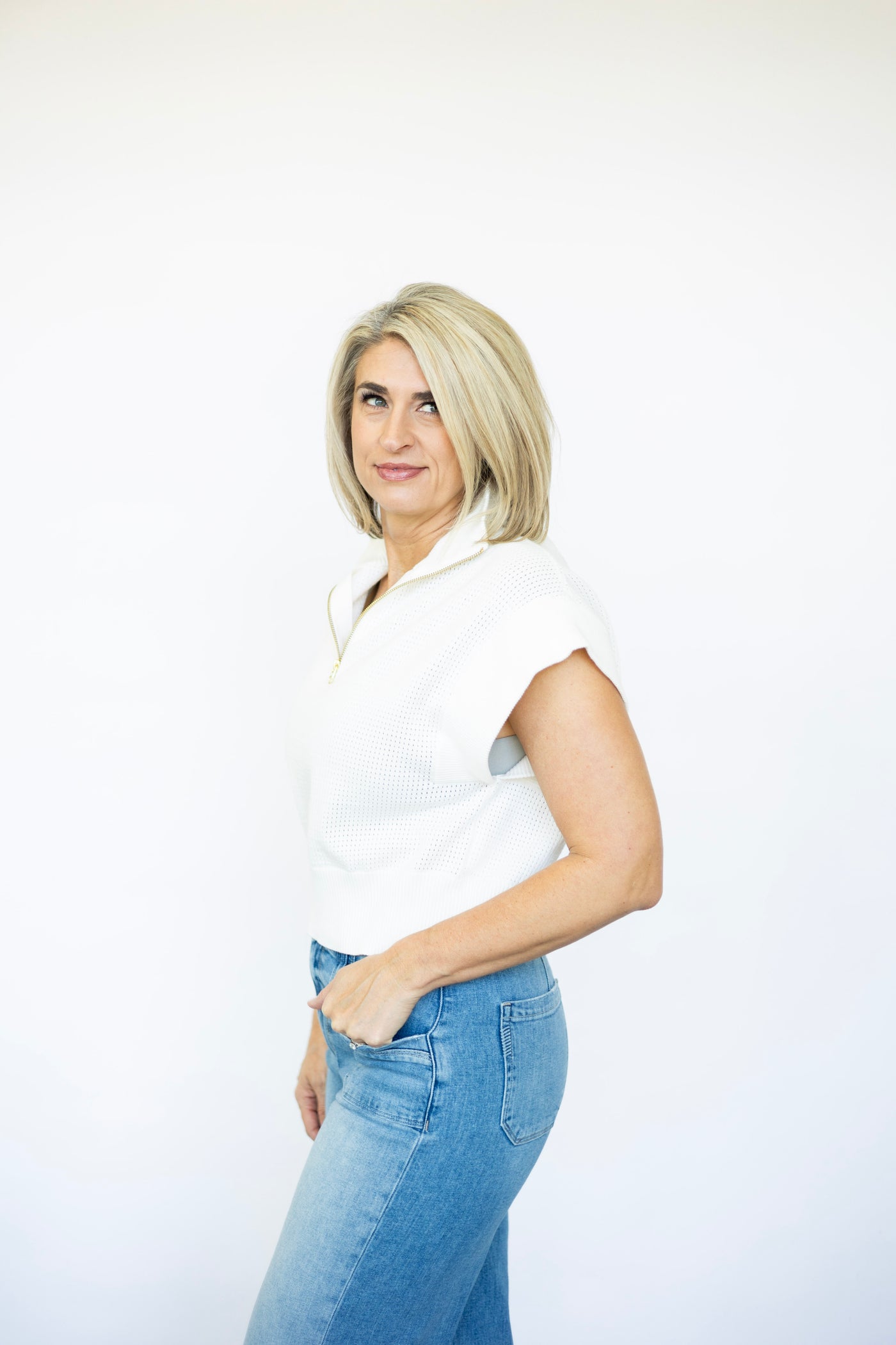 Women's open knit quarter zip sweater