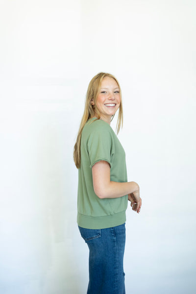 Casual green tee with cut out neckline