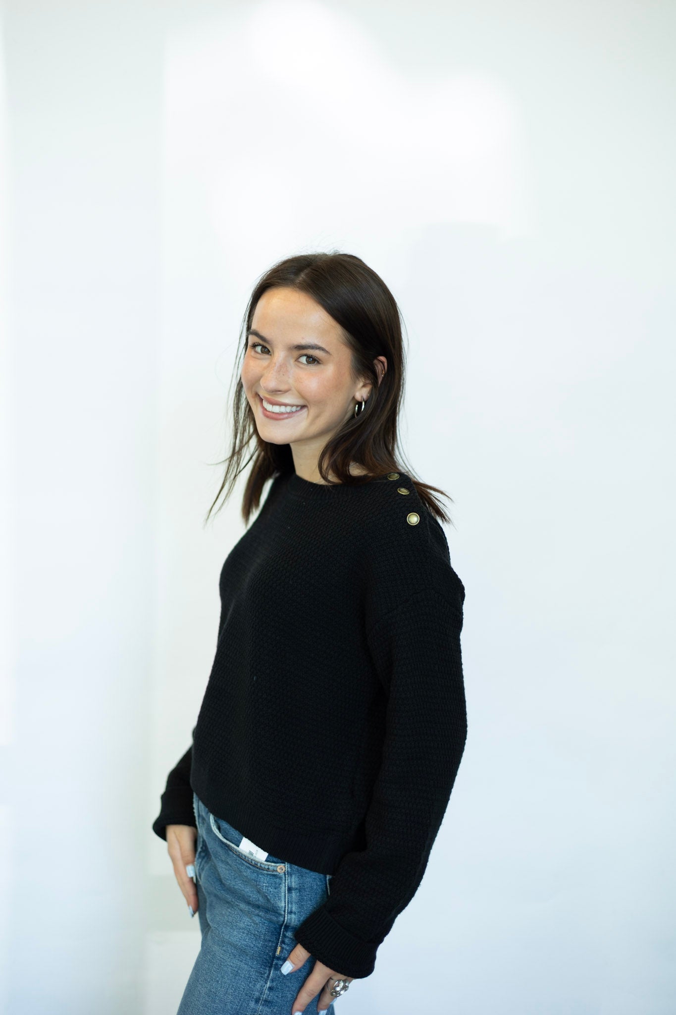 Black sweater with buttons on shoulder