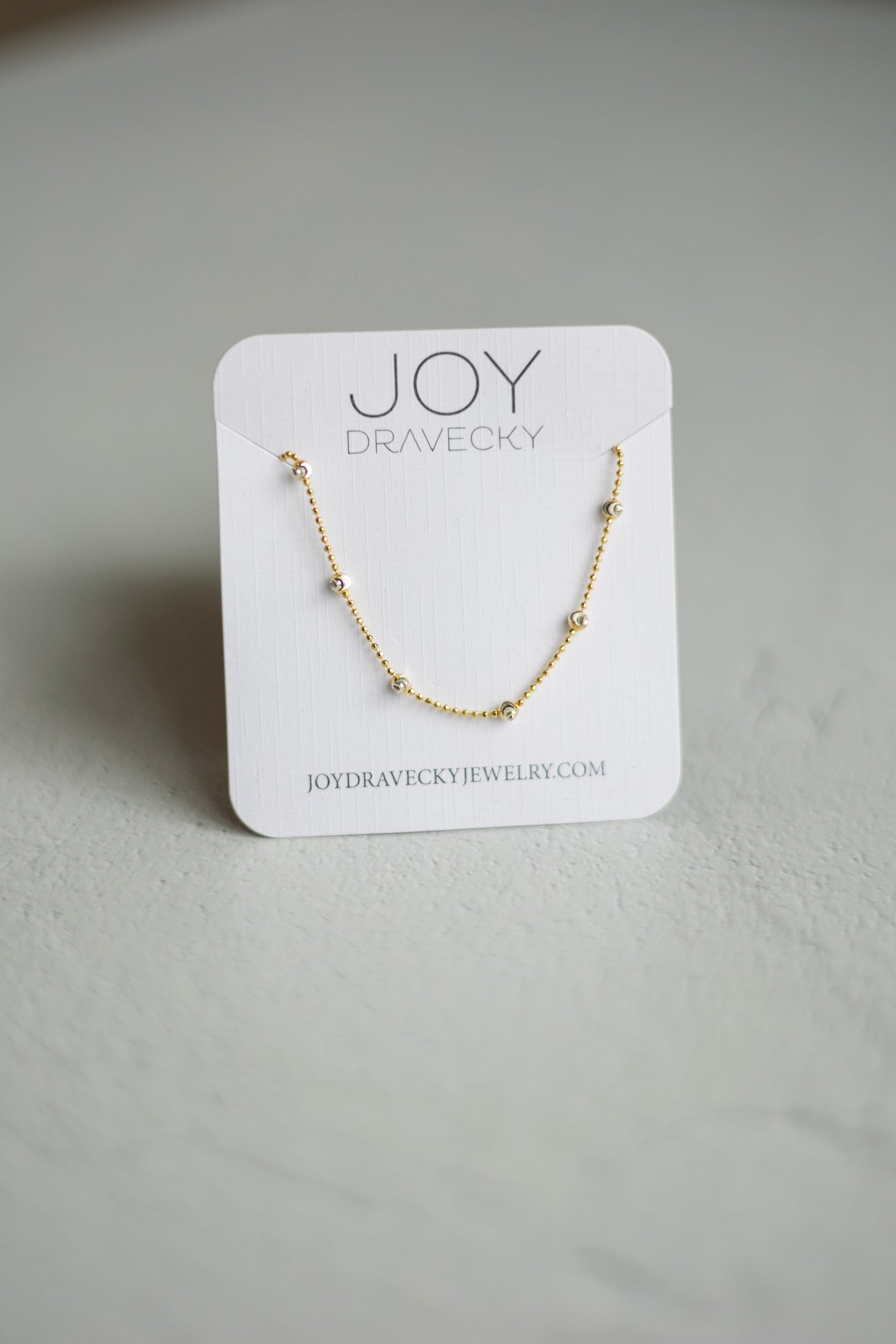 Joy Dravecky simple gold necklace