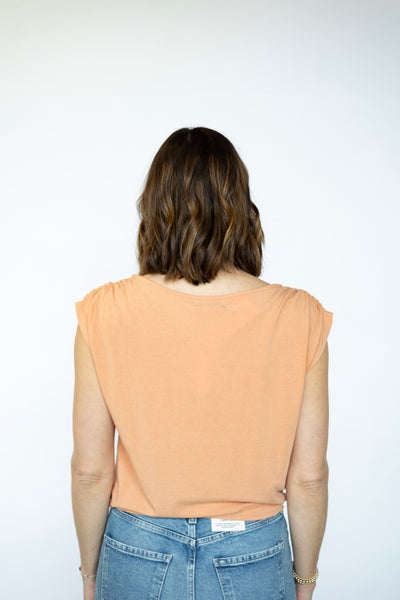 Sleeveless orange shirt for women