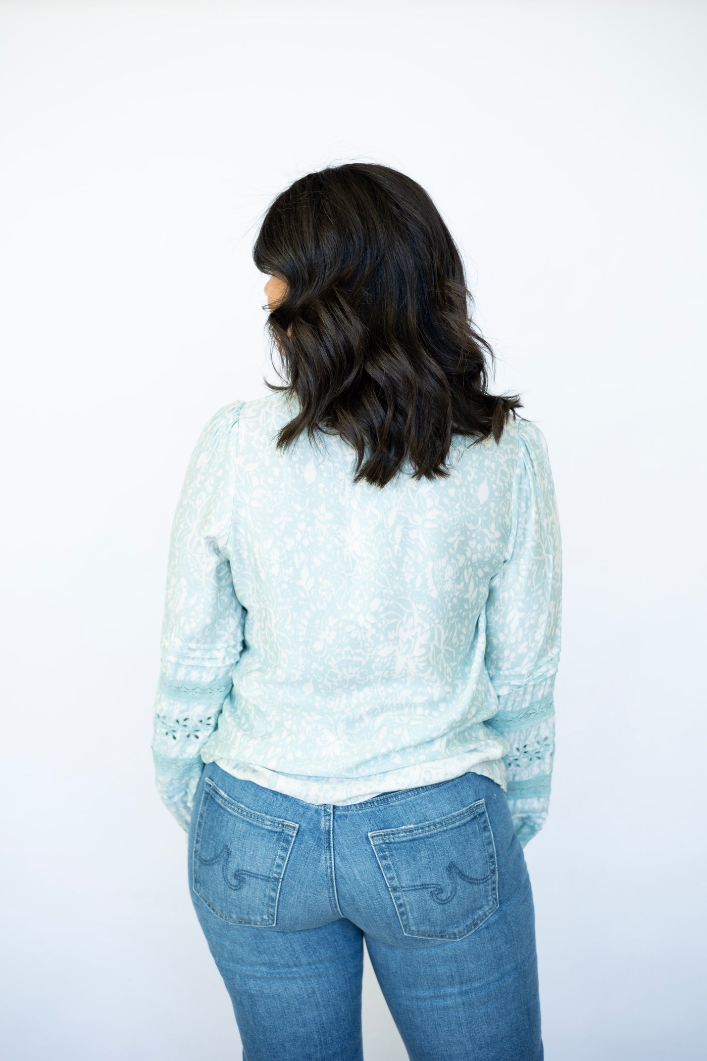 Light teal long sleeve blouse