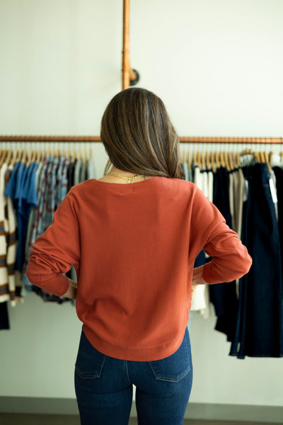 Orange, light sweater