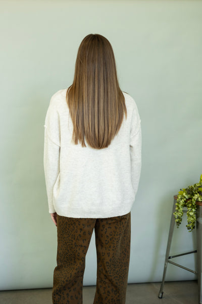 Light cream sweater for women