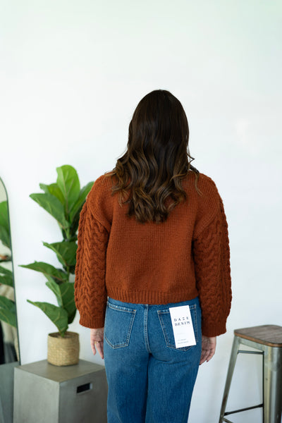 Rust color cable knit sweater