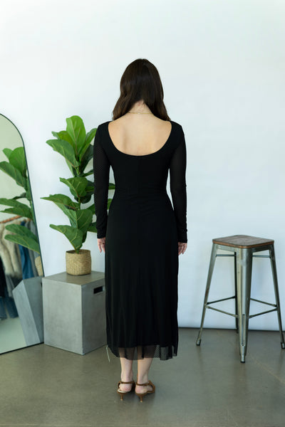 Long, black dress with polka dots