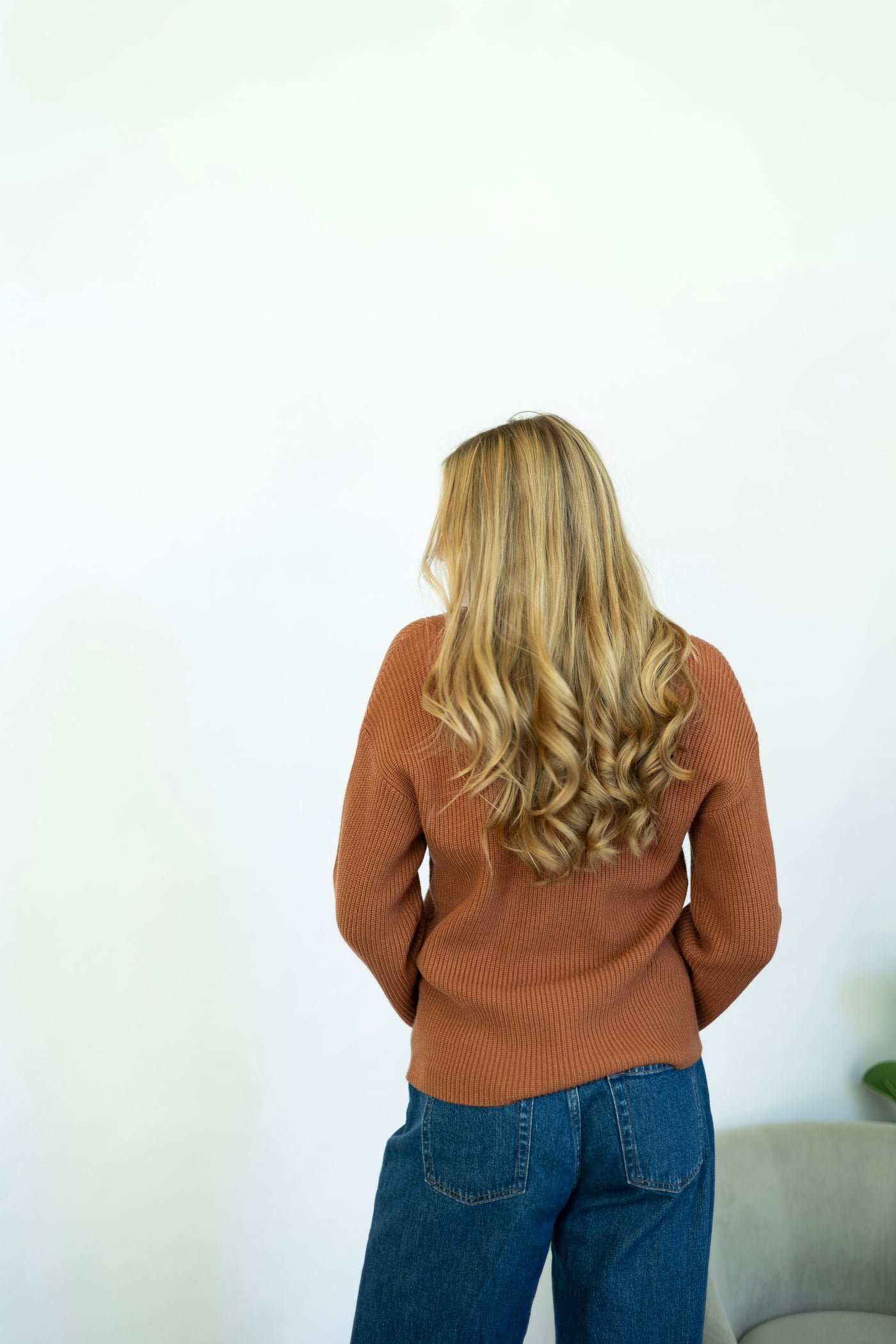 Women's orange v-neck sweater