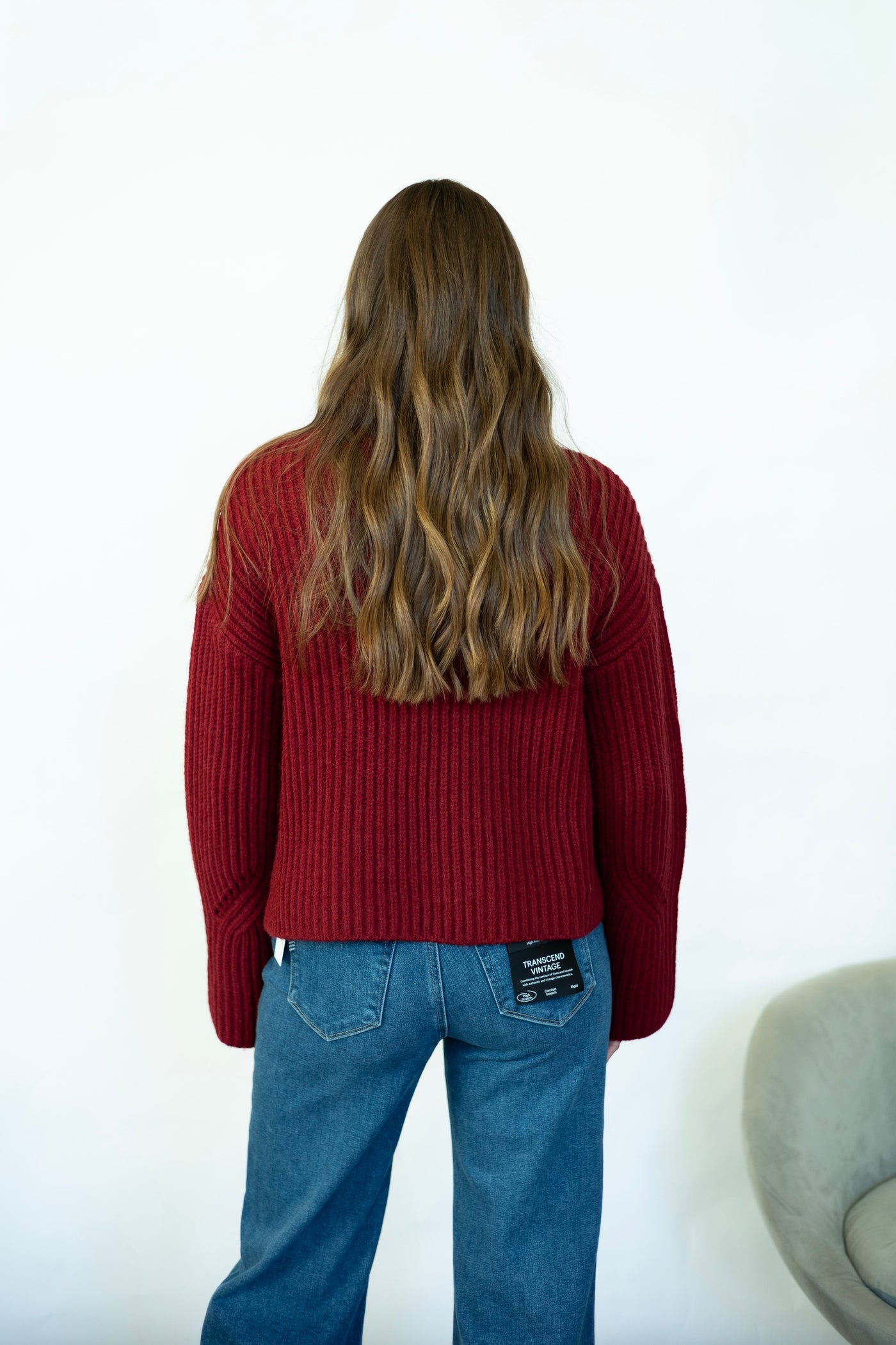 Red turtleneck sweater with wide sleeves