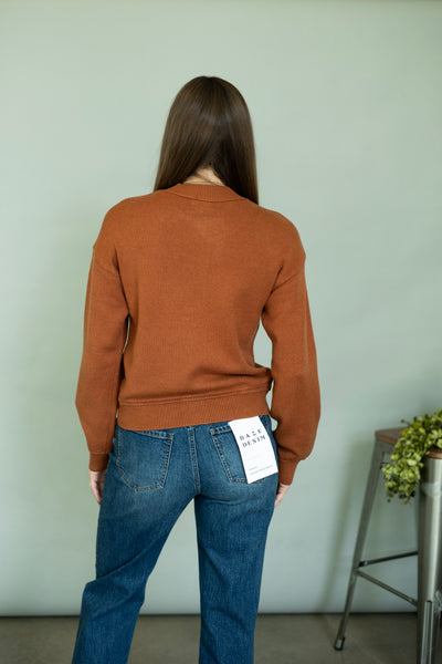 Orange cardigan sweater