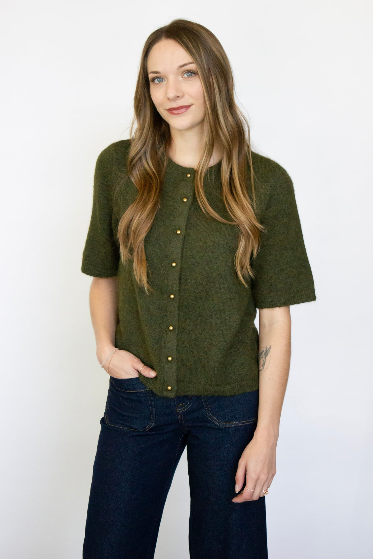 Green cardigan with gold buttons